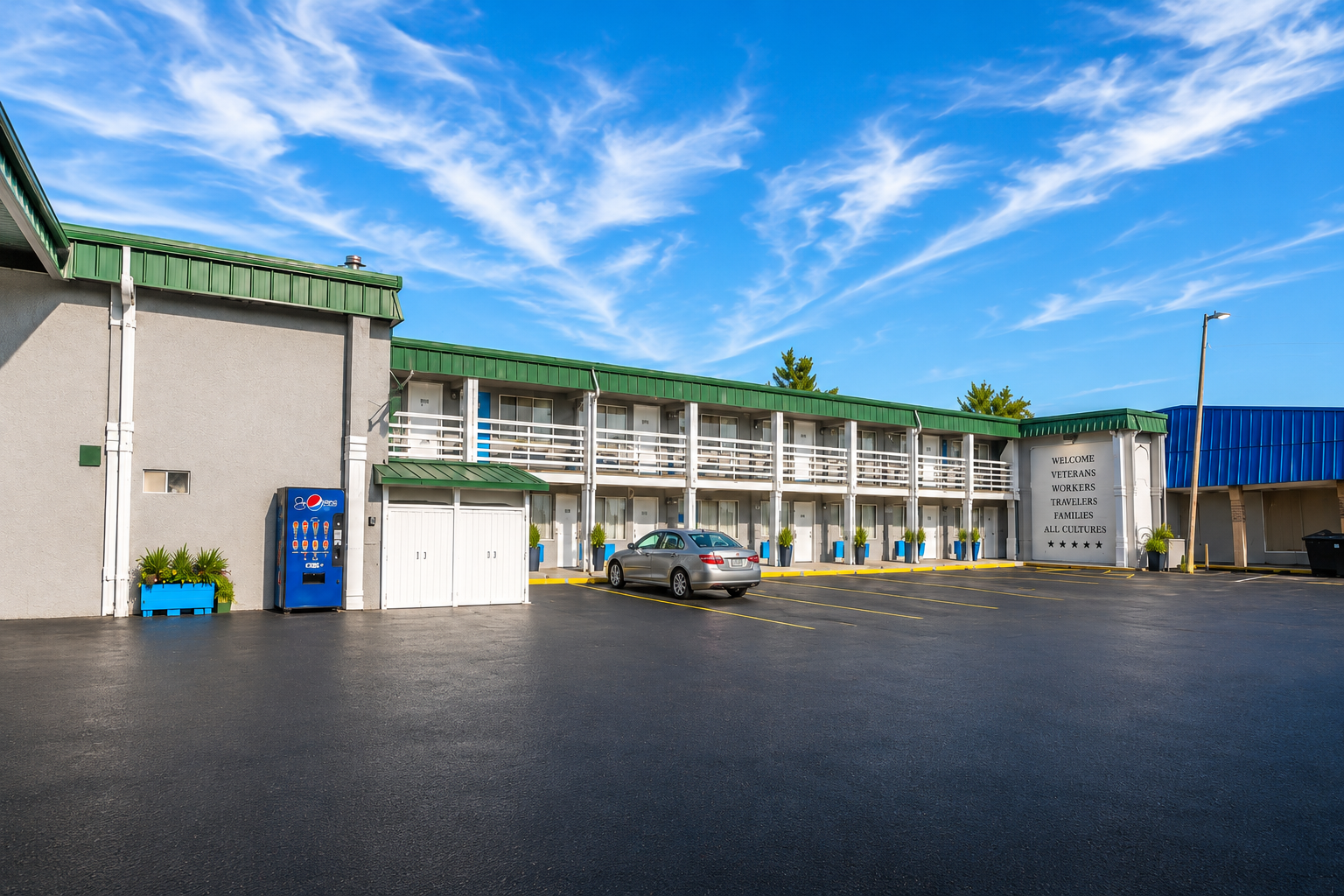 Seminole Inn parking lot on a sunny day showing the full property frontage